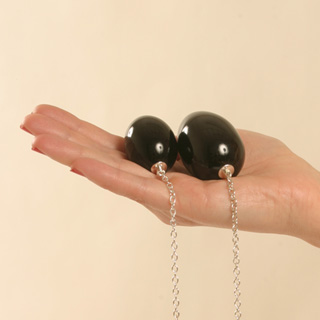 OE1 Insertable black egg with gold chain, black bow, and pendant